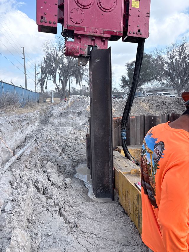 Close-up of pile driving work on a construction site